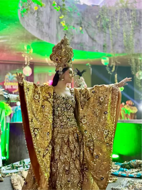 Golden carnival queen costume with crown